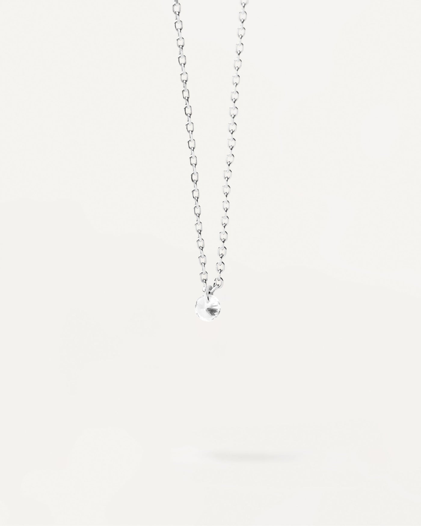 Sterling silver minimal necklace with round zirconia pendant