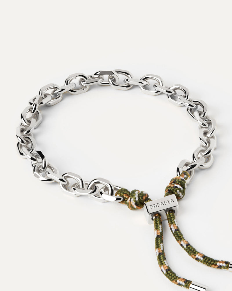 Silver tone chain bracelet with a forest green rope adjustable sliding clasp