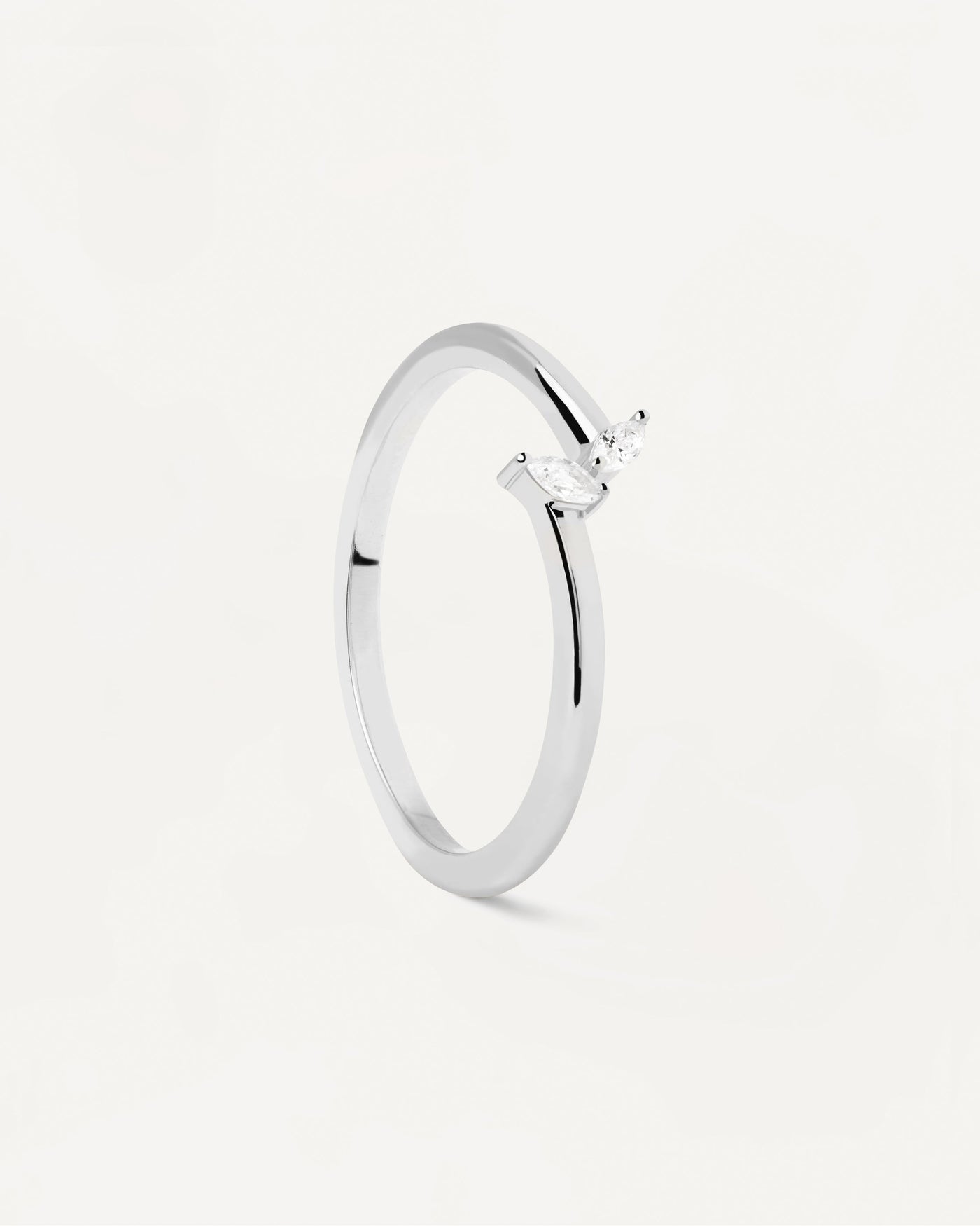 Anillo tú-y-yo en plata de ley con delicadas circonitas blancas