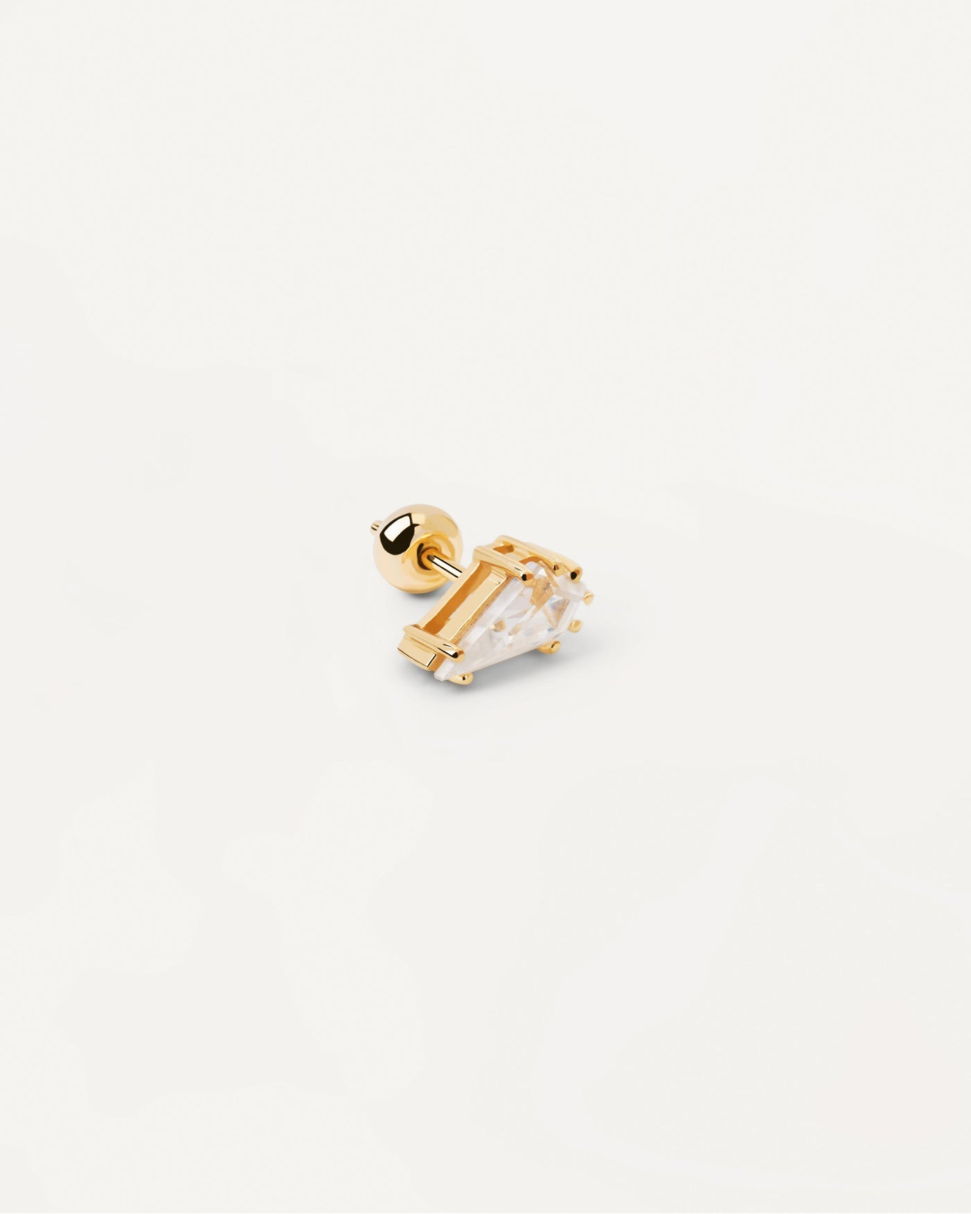 Gold-plated ear piercing with drop shaped white zirconia