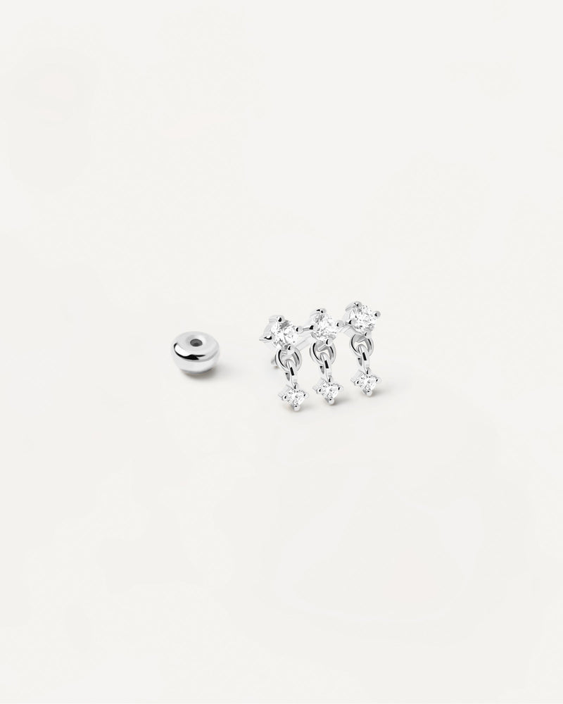 Sterling silver ear piercing with trinity of white zirconia