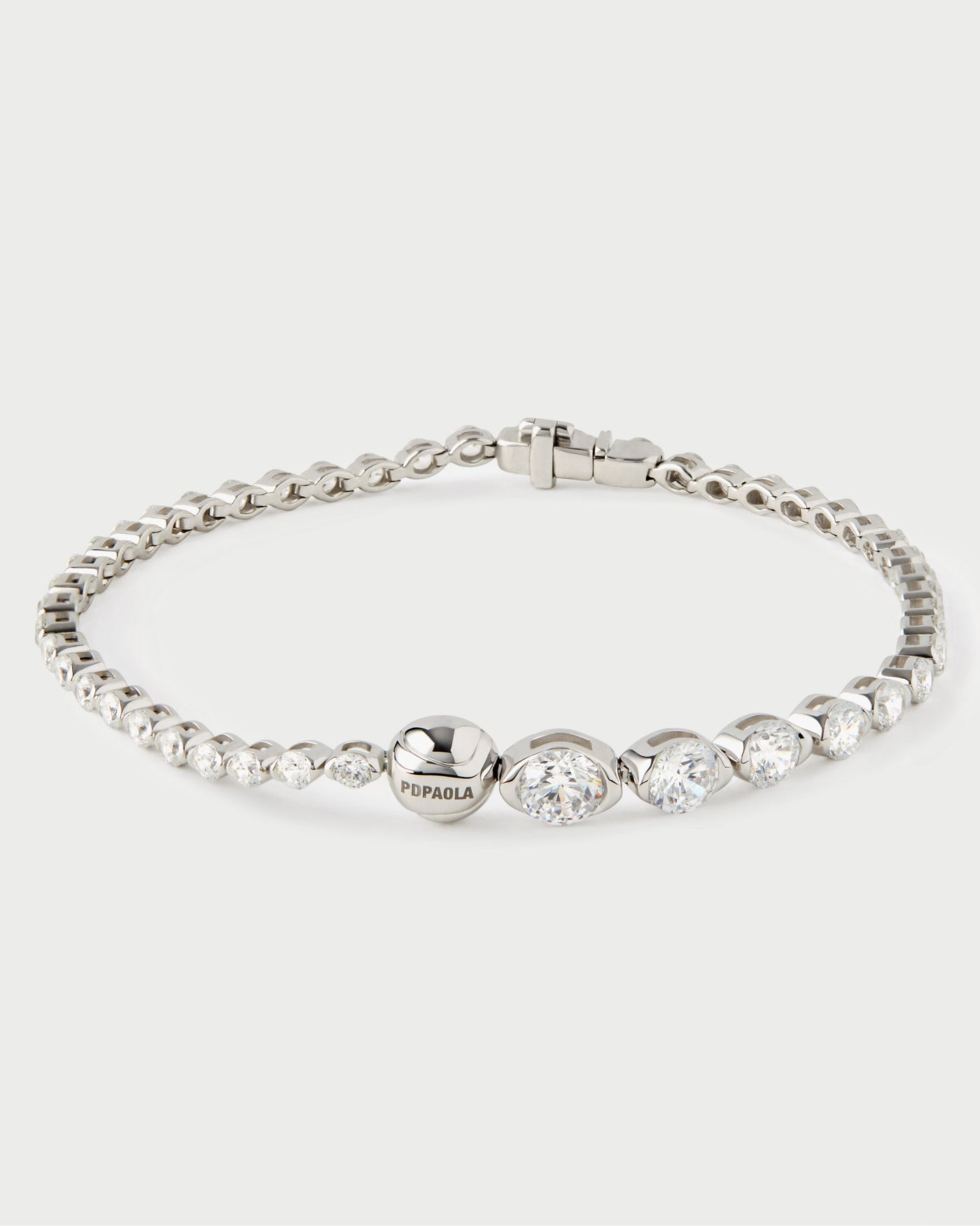 Bracciale tennis Smash 
  
    Oro bianco 18K / Placcatura in argento rodiato
  
