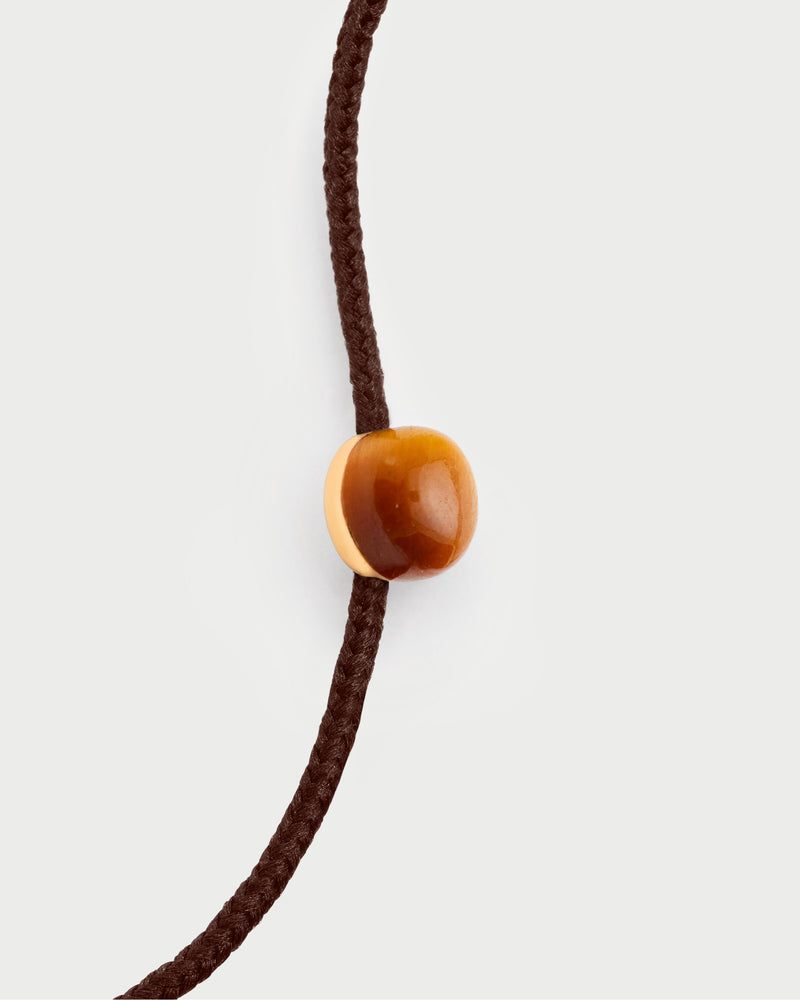 Bracciale a cordino Orion in occhio di tigre - 
  
    Gemma Naturale / Placcato Oro 18K
  
