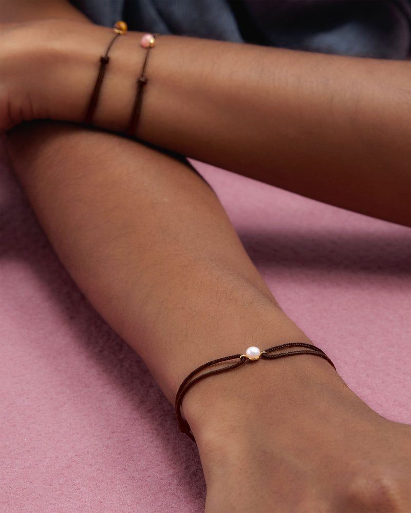 Bracciale a cordino Orion con perla - 
  
    Perla Naturale / Placcato Oro 18K
  
