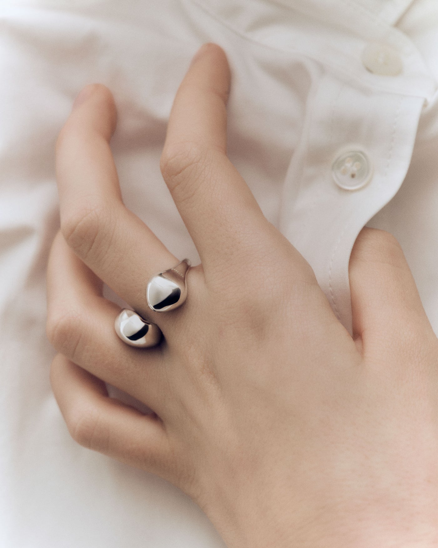 Silver sculptural open ring with two organic drops | Gravity ring 