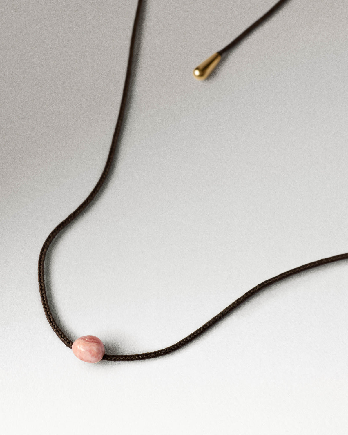 Kordelkette Orion aus Rhodochrosit - 
  
    Natürlicher Edelstein / 18K Vergoldet
  
